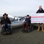 Donation from Pooleys, with Dave T and Colin